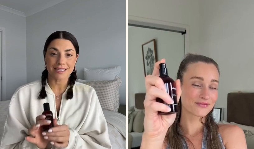 Two women holding Balmain Body bottles